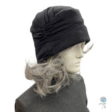 Alice cloche hat in black linen modeled on a mannequin