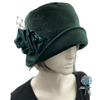 Eleanor narrow front brim dark green velvet with green flowers and wide hole black net brooch 