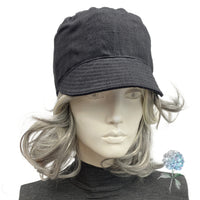 Black linen cadet cap front view modeled on a mannequin