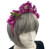 purple pink cherry blossom fascinator headband modeled on a mannequin 