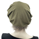 Olive green - khaki green cotton knit beret hat Modeled on a hat mannequin