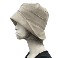 Alice Beige linen wide brim cloche hat women with bow brooch side view