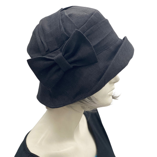 1920s Style cloche hat handmade in black linen with linen bow brooch side view  Boston Millinery handmade 