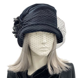 black cloche hat with bird cage veil