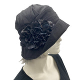 Black hydrangea brooch shown modeled on a black linen Alice cloche hat