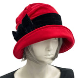 1920s cloche hat in red velvet with black velvet band and bow  from view