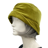 Vintage style cloche hat in chartreuse velvet with hydrangea flower brooch side view