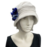 Alice cloche narrow brim hat  hat in antique white linen with blues hydrangea petal brooch 