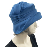 Boston Millinery's Beautiful vintage inspired 1920s cloche hat for women handmade in blue velvet unique design shown modeled on a hat mannequin 