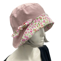 Betty cloche hat in dusky pink linen with pink cotton floral brim and bow 