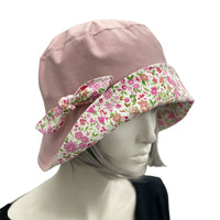 Betty cloche hat in dusky pink linen with pink cotton floral brim and bow  Boston Millinery