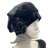 Black Velvet Beret with Hydrangea Brooch modeled on a hat mannequin  handmade Boston Millinery 