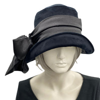 Vintage inspired 1920s style cloche hat handmade in black velvet with a satin band and bow Boston Millinery made in the USA side view