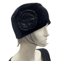 Simple black velvet toque with satin and lace flower brooch