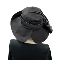 Couture Black linen derby hat with satin band and bow Handmade open rear brim