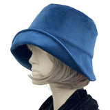 Blue velvet cloche Hat from Boston Millinery with hydrangea brooch plain side view