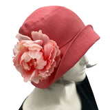 Eleanor Coral Linen pale coral peony brooch  wide front brim cloche hat women  Boston Millinery  flower view