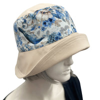 Floral Summer Sun Hat in Beige and Blue with a wide front brim side view Boston Millinery