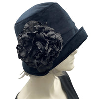 Black Velvet Eleanor cloche hat with large black peony brooch, handmade. y Boston Millinery modeled on a mannequin 