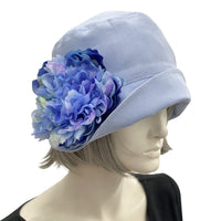Eleanor cloche hat women Pale Blue linen with large peony brooch flower view