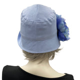 Eleanor cloche hat women Pale Blue linen with large peony brooch rear view