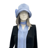 Eleanor narrow brim Pale blue linen with chiffon rose brooch  and necklace scarf Boston Millinery 
