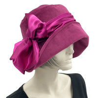 Vintage inspired 1920s style cloche hat handmade in raspberry velvet with a satin band and bow Boston Millinery made in the USA side view