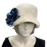 Eleanor small brim cream linen cloche hat with Peont Brooch in ribbon daisy brooch