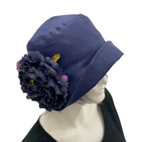 Eleanor cloche hat women in navy blue linen with large peony style flower brooch handmade by Boston Millinery