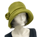 Boston Millinery's cozy winter cloche with an equidistant shape brim shown in olive green front view