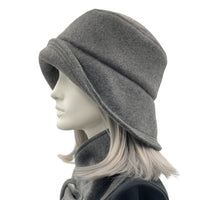 Eleanor cloche hat with equidistant brim handmade in gray fleece and modeled on a mannequin 
