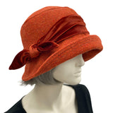 20s cloche hat in burnt orange wool with velvet band and bow side view