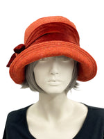 20s cloche hat in burnt orange wool with velvet band and bow  front view