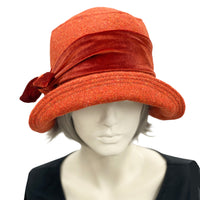 20s cloche hat in burnt orange wool with velvet band and bow top view