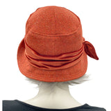 20s cloche hat in burnt orange wool with velvet band and bow rear view