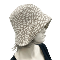 1920s style flapper hat in summer neutral spotty fabric 