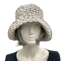 1920s style flapper hat in summer neutral spotty fabric  front view