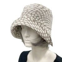1920s style flapper hat in summer neutral spotty fabric side view