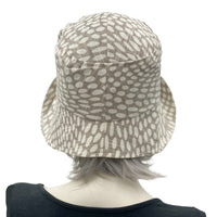 1920s style flapper hat in summer neutral spotty fabric rear view