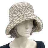 1920s style flapper hat in summer neutral spotty fabric  front view