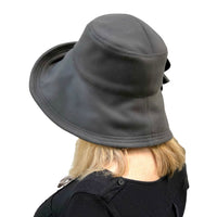 Wide brim Eleanor cloche in gray wool with fabric flower brooch handmade Boston Millinery enclosed rear brim