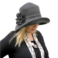 Wide brim Eleanor cloche in gray wool with fabric flower brooch handmade Boston Millinery