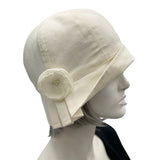 Boston Millinery's Polly Cloche hat 1920s style shown here in cream color linen accented with  Edit alt text