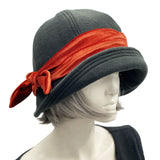 1920s style Polly cloche hat in black fleece with stretch velvet band and bow in rust contrast color choice 