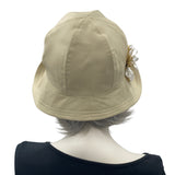 Polly wide front brim beige ,linen cloche hat with ribbon flower and button brooch  rear view