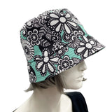 Aqua floral showerproof Rain hat bucket hat for women side view