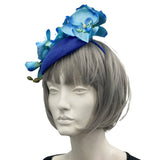 Royal Blue Fascinator with teal turquoise orchid flowers handmade millinery USA side view