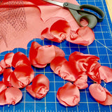 Coral flower handmade fascinator satin the Duchess 