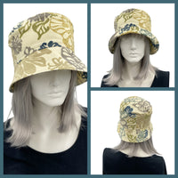 Leaf Print bucket hat shown modeled on hat mannequin handmade by Boston Millinery various views