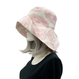 pink paisley derby hat side view of large pink flower Derby Races weddings formal events